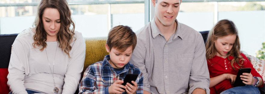 family all on their phones